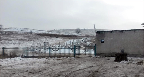 Cemetery. Black spot is a place of mass graves. Photo by Nikolai Petrov for the 'Caucasian Knot'. Cemetery. Black spot is a place of mass graves. Photo by Nikolai Petrov for the 'Caucasian Knot'.