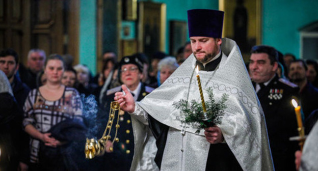 Christmas liturgy. Photo by Aziz Karimov for the 'Caucasian Knot'. Christmas liturgy. Photo by Aziz Karimov for the 'Caucasian Knot'.
