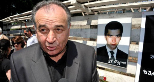 David Vazagashvili near the portrait of his son Zurab Vazagashvili. Photo: RFE/RL