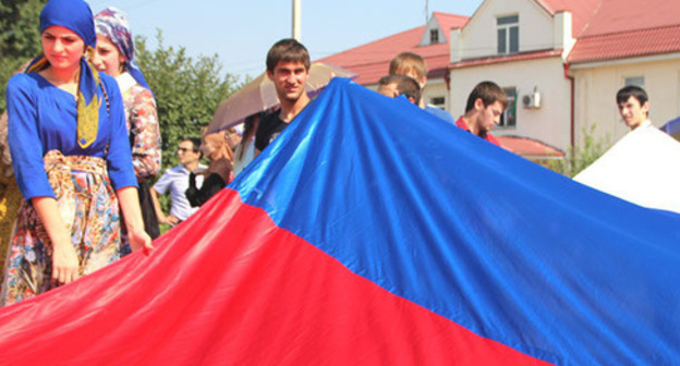 Celebration of the State Flag in Grozny. Photo by Magomed Magomedov for "Caucasian Knot" Celebration of the State Flag in Grozny. Photo by Magomed Magomedov for "Caucasian Knot"