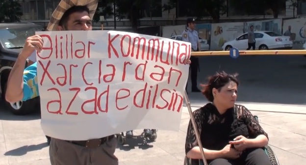 People with disabilities hold protest in front of the Ministry of Labour and Social Protection of Population of Azerbaijan in Baku, June 6, 2017. People with disabilities hold protest in front of the Ministry of Labour and Social Protection of Population of Azerbaijan in Baku, June 6, 2017.