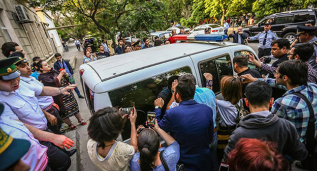 Police car with detained Afghan Mukhtarly. Photo by Aziz Karimov for the Caucasian Knot. Police car with detained Afghan Mukhtarly. Photo by Aziz Karimov for the Caucasian Knot.