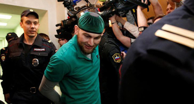 Shagid Gubashev in custody. Photo: REUTERS/Sergey Karpuhin Shagid Gubashev in custody. Photo: REUTERS/Sergey Karpuhin