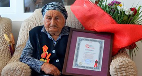 Nanu Shaova, a 127-year-old resident of the Baksan District of Kabardino-Balkaria. Photo: http://kbrria.ru/sites/default/files/field/image/dsc_5183.jpg Nanu Shaova, a 127-year-old resident of the Baksan District of Kabardino-Balkaria. Photo: http://kbrria.ru/sites/default/files/field/image/dsc_5183.jpg
