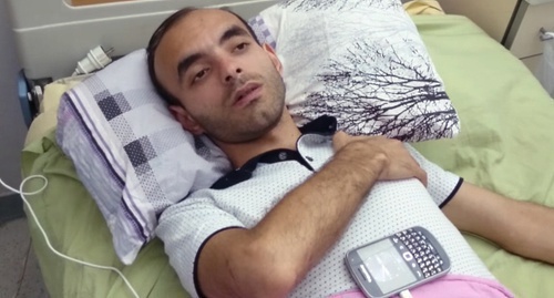 Rasim Aliev at the hospital. Screenshot of the interview with the journalist, Youtube.com/watch?t=10&v=wigU5a7vRHM Rasim Aliev at the hospital. Screenshot of the interview with the journalist, Youtube.com/watch?t=10&v=wigU5a7vRHM