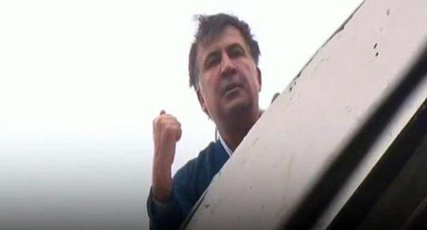 Mikhail Saakashvili on the roof of his house during search conducted by Ukrainian law enforcers in his apartment. Still picture of video by NEWSONE TV Channel, https://www.youtube.com/results?search_query=newsone Mikhail Saakashvili on the roof of his house during search conducted by Ukrainian law enforcers in his apartment. Still picture of video by NEWSONE TV Channel, https://www.youtube.com/results?search_query=newsone