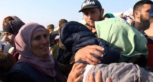 Women and children return from Syria to Chechnya, Grozny, October 21, 2017. Screenshot: video posted by user Russia 24, https://www.youtube.com/watch?v=Au-M3DuD-9I Women and children return from Syria to Chechnya, Grozny, October 21, 2017. Screenshot: video posted by user Russia 24, https://www.youtube.com/watch?v=Au-M3DuD-9I