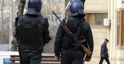 Law enforcers. Photo: REUTERS/David Mdzinarishvili Law enforcers. Photo: REUTERS/David Mdzinarishvili