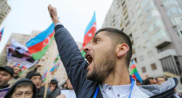 Participant of a rally against the results of presidential election in Azerbaijan, Baku, April 14, 2018. Photo by Aziz Karimov for the Caucasian Knot. Participant of a rally against the results of presidential election in Azerbaijan, Baku, April 14, 2018. Photo by Aziz Karimov for the Caucasian Knot.