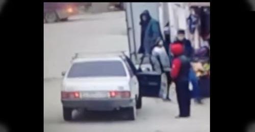 Teenager near the car. Screenshot from video posted by Nurmagomeg Astarkhanov,
https://www.youtube.com/watch?time_continue=34&v=A8kHYg7CJlU
Teenager near the car. Screenshot from video posted by Nurmagomeg Astarkhanov,
https://www.youtube.com/watch?time_continue=34&v=A8kHYg7CJlU
