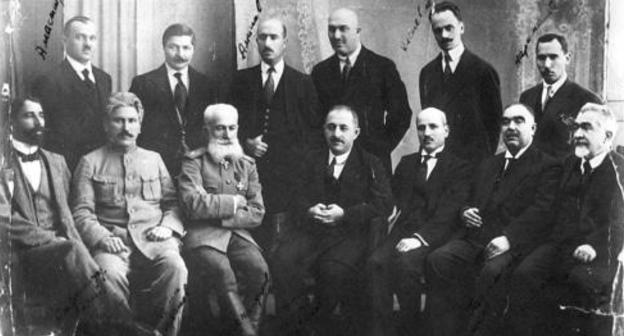 Cabinet Ministers of the Azerbaijan Democratic Republic (ADR). From left to right, sitting: A. Safikurdsky, H. Melik-Aslanov, S. Mekhmandarov, N. Usubbekov, M. Y. Djafarov, A. Gasanov and и A. N. Dostakov; standing: H. Amaspyur, R. Z. Kaplanov, A. Aminov, D. Gadjinsky, V. V. Klenovsky, N. Narimanbekov. Photo: https://www.ourbaku.com Cabinet Ministers of the Azerbaijan Democratic Republic (ADR). From left to right, sitting: A. Safikurdsky, H. Melik-Aslanov, S. Mekhmandarov, N. Usubbekov, M. Y. Djafarov, A. Gasanov and и A. N. Dostakov; standing: H. Amaspyur, R. Z. Kaplanov, A. Aminov, D. Gadjinsky, V. V. Klenovsky, N. Narimanbekov. Photo: https://www.ourbaku.com