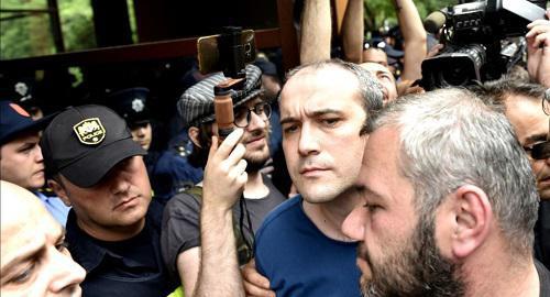 Zviad Kuprava and Zaza Saralidze at a protest action. Photo by Mzia Saganelidze (RFE/RL)