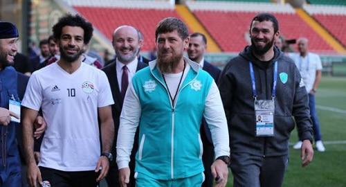 Mohamed Salah, Ramzan Kadyrov and Magomed Daudov (from left to right) visit stadium in Grozny. Photo by provided by press service of the Chechen Parliament, http://www.parlamentchr.ru/press-centre/news/7382-v-groznyj-pribyla-sbornaya-egipta-po-futbolu Mohamed Salah, Ramzan Kadyrov and Magomed Daudov (from left to right) visit stadium in Grozny. Photo by provided by press service of the Chechen Parliament, http://www.parlamentchr.ru/press-centre/news/7382-v-groznyj-pribyla-sbornaya-egipta-po-futbolu