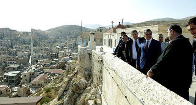 Anatoly Bibilov, the President of South Ossetia, visited the major holy sites in Syria. Photo by the press service of the President of South Ossetia https://sputnik-ossetia.ru/South_Ossetia/20180725/6813134.html Anatoly Bibilov, the President of South Ossetia, visited the major holy sites in Syria. Photo by the press service of the President of South Ossetia https://sputnik-ossetia.ru/South_Ossetia/20180725/6813134.html