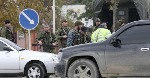 Law enforcers. Photo: REUTERS/Alkhan Gargayev Law enforcers. Photo: REUTERS/Alkhan Gargayev