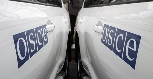 OSCE cars. Photo: REUTERS/Gleb Garanich OSCE cars. Photo: REUTERS/Gleb Garanich