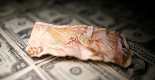 The Turkish lira and the dollars. Photo: REUTERS/Dado Ruvic/Illustration The Turkish lira and the dollars. Photo: REUTERS/Dado Ruvic/Illustration