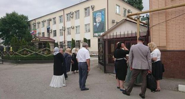 People at the Shali City Court in Chechnya. Photo is provided by the press service of HRC 'Memorial' People at the Shali City Court in Chechnya. Photo is provided by the press service of HRC 'Memorial'
