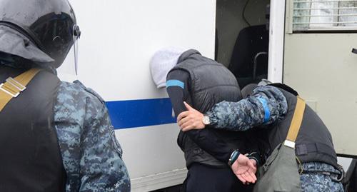 Law enforcers during detention. Photo by the press service of Russia's National Anti-Terrorism Committee http://nac.gov.ru/ Law enforcers during detention. Photo by the press service of Russia's National Anti-Terrorism Committee http://nac.gov.ru/