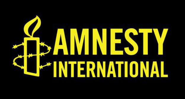 Logo of the human rights organization "Amnesty International". Photo https://amnesty.org.ru/tags/россия/ Logo of the human rights organization "Amnesty International". Photo https://amnesty.org.ru/tags/россия/