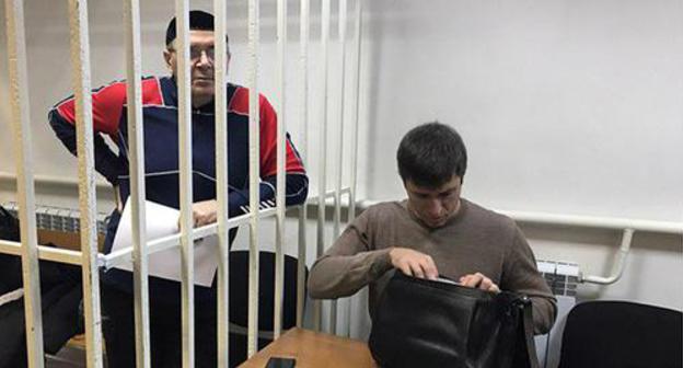 Oyub Titiev with his advocate Pyotr Zaikin in the court room. Photo by Patimat Makhmudova for the "Caucasian Knot" Oyub Titiev with his advocate Pyotr Zaikin in the court room. Photo by Patimat Makhmudova for the "Caucasian Knot"