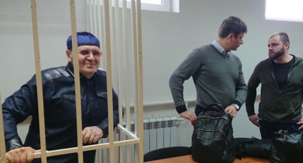 Oyub Titiev (left) and his advocates in the courtroom. Photo by Patimat Makhmudova for the Caucasian Knot Oyub Titiev (left) and his advocates in the courtroom. Photo by Patimat Makhmudova for the Caucasian Knot