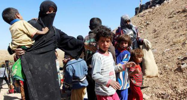 A woman with children, Kirkuk, Iraq, October 4, 2017. Photo: REUTERS/АКО Рашид A woman with children, Kirkuk, Iraq, October 4, 2017. Photo: REUTERS/АКО Рашид