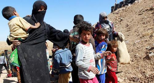 A woman with children, Kirkuk, Iraq, October 4, 2017. Photo: REUTERS/АКО Рашид A woman with children, Kirkuk, Iraq, October 4, 2017. Photo: REUTERS/АКО Рашид