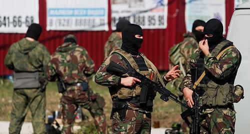 Law enforcers. Photo: REUTERS/Maxim Shemetov Law enforcers. Photo: REUTERS/Maxim Shemetov