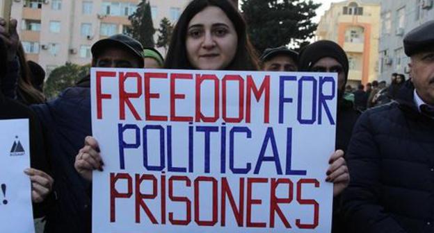 Rally participant in Baku demand to release political prisoners. Photo by Aziz Karimov for the Caucasian Knot Rally participant in Baku demand to release political prisoners. Photo by Aziz Karimov for the Caucasian Knot
