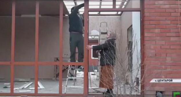 Residents of Tsentaroi at their house. Screenshot from video posted by 'Grozny' TV Company, https://www.youtube.com/watch?time_continue=26&v=QOYKFqW2ZFI Residents of Tsentaroi at their house. Screenshot from video posted by 'Grozny' TV Company, https://www.youtube.com/watch?time_continue=26&v=QOYKFqW2ZFI