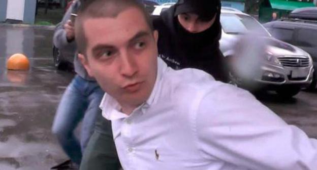 Detention of Georgy Guev, a native of North Ossetia. Screenshot of the video by TASS https://www.youtube.com/watch?v=yYQEb5nf0Iw&feature=youtu.be Detention of Georgy Guev, a native of North Ossetia. Screenshot of the video by TASS https://www.youtube.com/watch?v=yYQEb5nf0Iw&feature=youtu.be