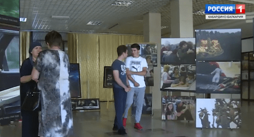 Exhibition 'Remember to Live', Nalchik. Screenshot from video report by KBR TV Exhibition 'Remember to Live', Nalchik. Screenshot from video report by KBR TV