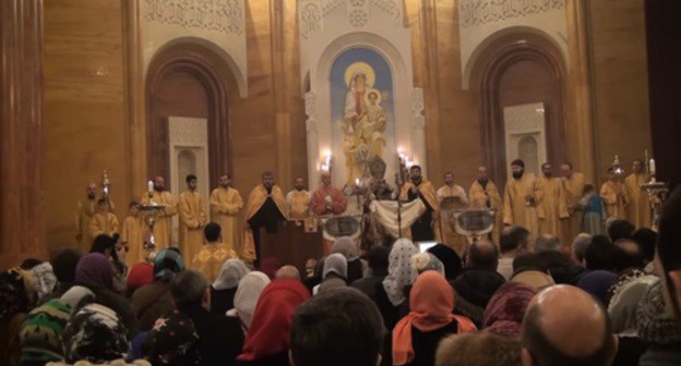 Christmas liturgy in a church in Armenia. Screenshot of the video by Arsen Dallakyan https://youtu.be/yhevTrMGRlQ Christmas liturgy in a church in Armenia. Screenshot of the video by Arsen Dallakyan https://youtu.be/yhevTrMGRlQ
