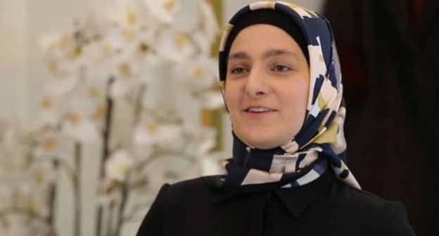 Aishat Kadyrova. Screenshot of the video posted at the Firdaws FH YouTube channel https://www.youtube.com/watch?v=yW7uL5EsYsw&feature=youtu.be Aishat Kadyrova. Screenshot of the video posted at the Firdaws FH YouTube channel https://www.youtube.com/watch?v=yW7uL5EsYsw&feature=youtu.be
