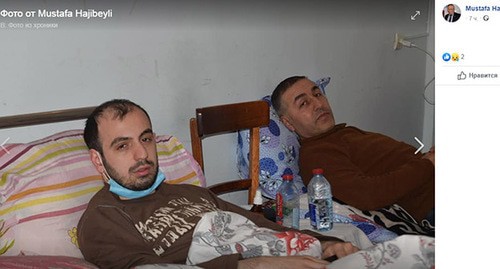 Elman Guliev (left) and Elshad Israfil. Screenshot: https://www.facebook.com/photo.php?fbid=3112192472144358&set=pcb.3112190252144580&type=3&theater Elman Guliev (left) and Elshad Israfil. Screenshot: https://www.facebook.com/photo.php?fbid=3112192472144358&set=pcb.3112190252144580&type=3&theater
