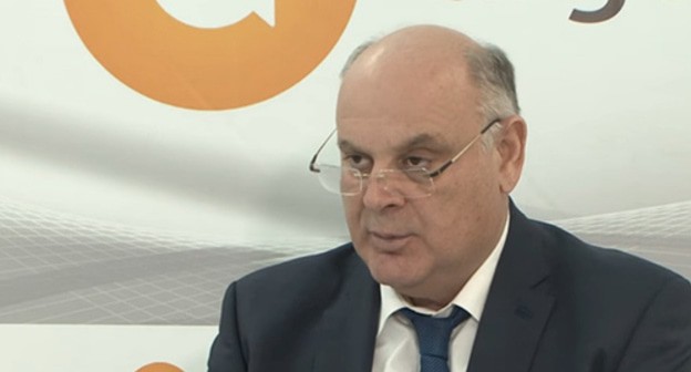Opposition leader Aslan Bzhaniya. Screenshot from YouTube video posted by apsny.today: https://www.youtube.com/watch?v=82SWzE0ZmOw Opposition leader Aslan Bzhaniya. Screenshot from YouTube video posted by apsny.today: https://www.youtube.com/watch?v=82SWzE0ZmOw