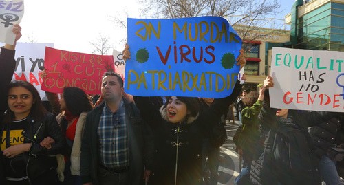 A poster saying, "Patriarchy is the most disgusting virus". Photo by Aziz Karimov for the "Caucasian Knot" A poster saying, "Patriarchy is the most disgusting virus". Photo by Aziz Karimov for the "Caucasian Knot"