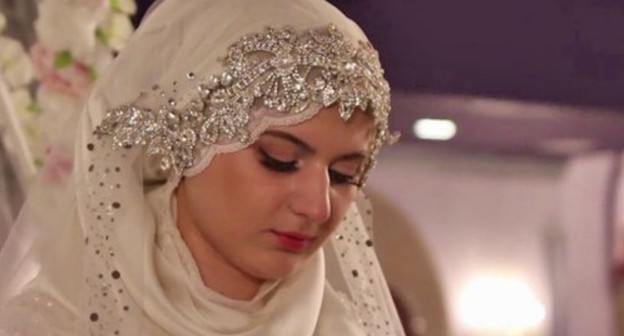A bride. Screenshot from video posted by 'Kavkazskaya politika' user at: https://www.youtube.com/watch?v=2xpRgf28g90 A bride. Screenshot from video posted by 'Kavkazskaya politika' user at: https://www.youtube.com/watch?v=2xpRgf28g90
