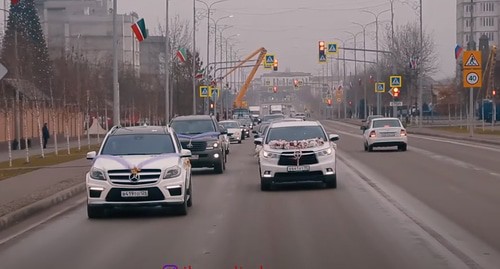 A wedding cortege in Chechnya. Screenshot of the video https://www.youtube.com/watch?v=vq01MTjUfGs A wedding cortege in Chechnya. Screenshot of the video https://www.youtube.com/watch?v=vq01MTjUfGs