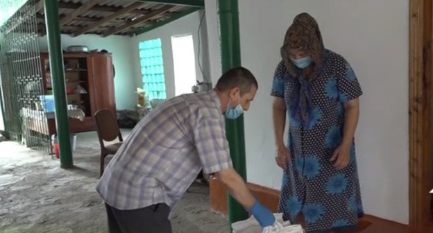 Distribution of food aid packages to the people in need. Screenshot of the video by the Grozny TV channel https://www.youtube.com/watch?v=tnpTrnzvwCk&feature=emb_logo Distribution of food aid packages to the people in need. Screenshot of the video by the Grozny TV channel https://www.youtube.com/watch?v=tnpTrnzvwCk&feature=emb_logo