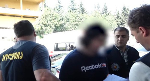 Detention of Mikhail Kalandiya. Screenshot: https://www.youtube.com/watch?v=nmvggRz3Q-Q&feature=emb_logo Detention of Mikhail Kalandiya. Screenshot: https://www.youtube.com/watch?v=nmvggRz3Q-Q&feature=emb_logo