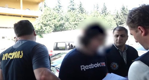 Detention of Mikhail Kalandiya. Screenshot: https://www.youtube.com/watch?v=nmvggRz3Q-Q&feature=emb_logo Detention of Mikhail Kalandiya. Screenshot: https://www.youtube.com/watch?v=nmvggRz3Q-Q&feature=emb_logo
