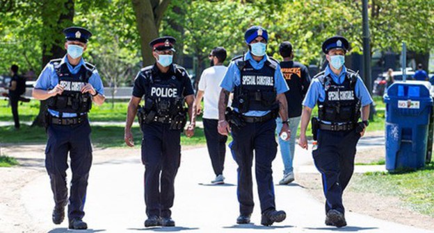 Policemen, Toronto. Photo: REUTERS/Carlos Osorio Policemen, Toronto. Photo: REUTERS/Carlos Osorio