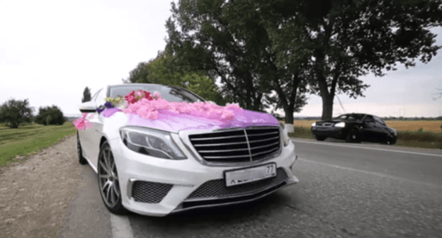 A wedding cortege. Screenshot of the video https://www.youtube.com/watch?v=EU8rWT-FgPQ A wedding cortege. Screenshot of the video https://www.youtube.com/watch?v=EU8rWT-FgPQ