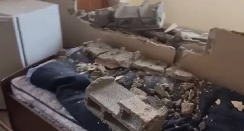 Wall of a building destroyed as a result of shelling attack on Stepanakert. Screenshot from the video posted by the Caucasian Knot Wall of a building destroyed as a result of shelling attack on Stepanakert. Screenshot from the video posted by the Caucasian Knot