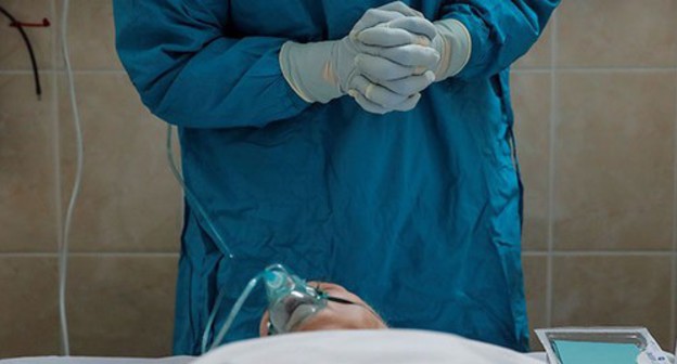A surgeon in an operating room. Photo: REUTERS/Maxim Shemetov A surgeon in an operating room. Photo: REUTERS/Maxim Shemetov