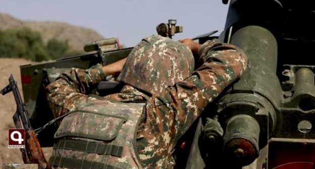 An Armenian soldier on the frontline. Screenshot of the video by the NK information centre https://www.facebook.com/ArtsakhInformation/videos/401158884385156/ An Armenian soldier on the frontline. Screenshot of the video by the NK information centre https://www.facebook.com/ArtsakhInformation/videos/401158884385156/
