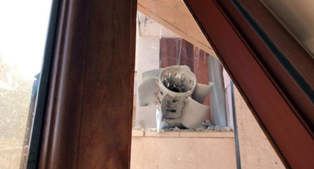 An unexploded ordnance stuck in a windowpane in home. Photo by Alvard Grigoryan for the "Caucasian Knot" An unexploded ordnance stuck in a windowpane in home. Photo by Alvard Grigoryan for the "Caucasian Knot"
