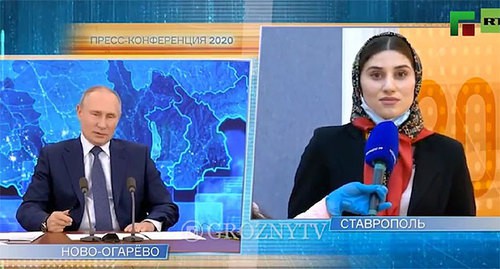 Madina Musaeva, a journalist of the Chechen "Vainakh" TV Channel, listening to Vladimir Putin's answer to a question about Ramzan Kadyrov. Screenshot of the video by the "Grozny" TV channel https://www.instagram.com/p/CI7jM9PFB_S/ Madina Musaeva, a journalist of the Chechen "Vainakh" TV Channel, listening to Vladimir Putin's answer to a question about Ramzan Kadyrov. Screenshot of the video by the "Grozny" TV channel https://www.instagram.com/p/CI7jM9PFB_S/